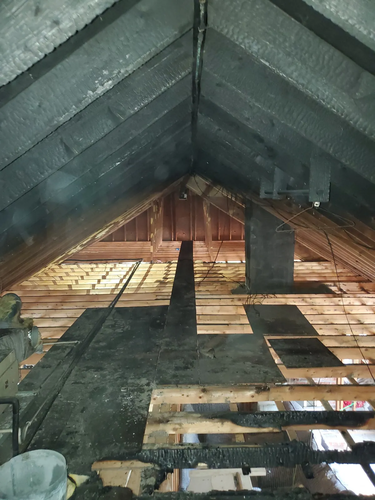 Attic roof framing during restoration work.