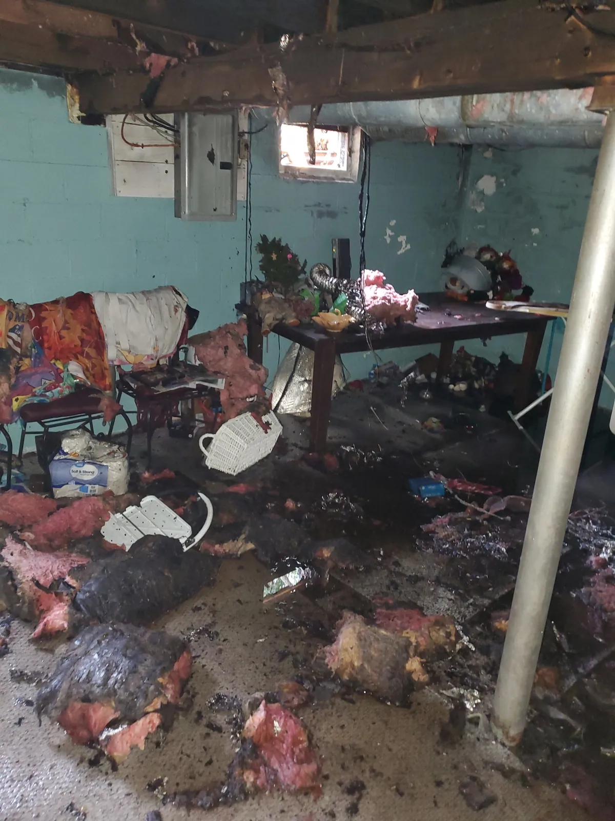 Water-damaged basement during cleanup.