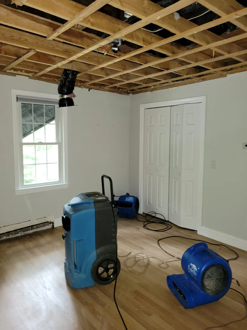 Drying equipment set up inside a residence.