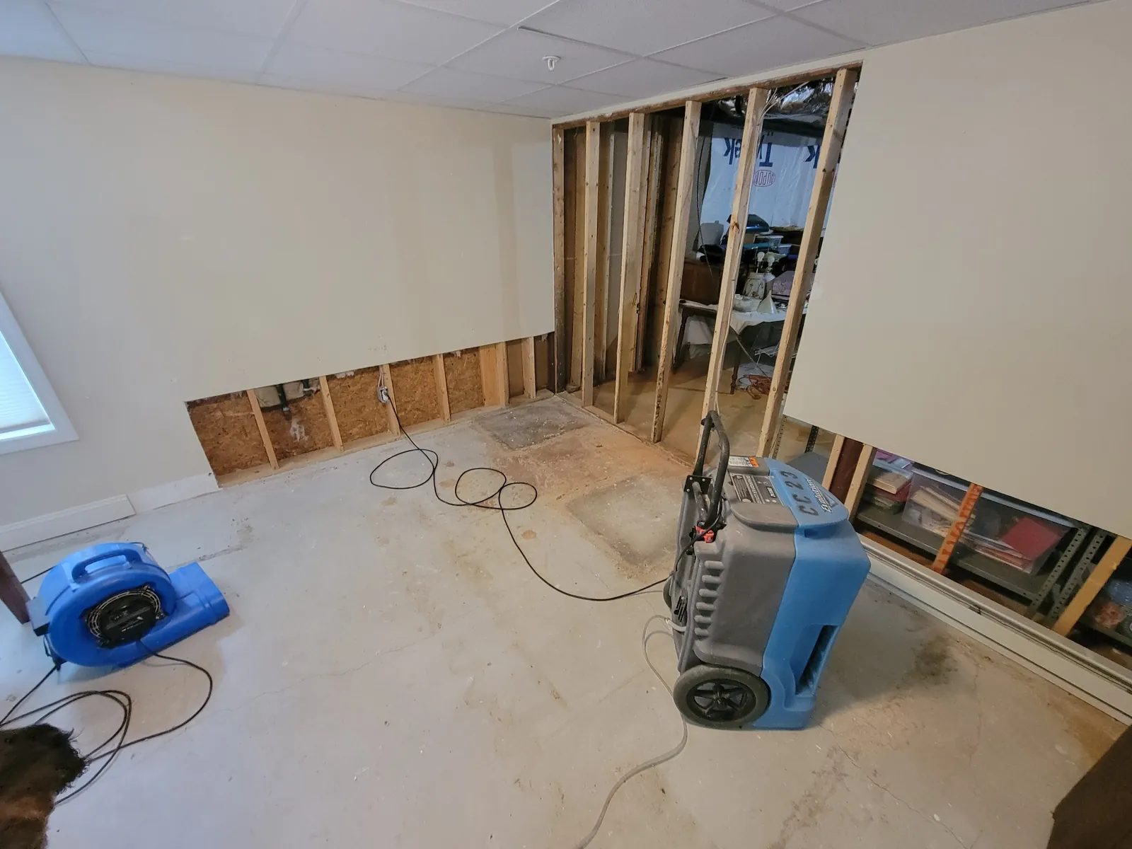 Restoration drying equipment set up inside a residence.
